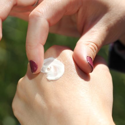 person with white nail polish